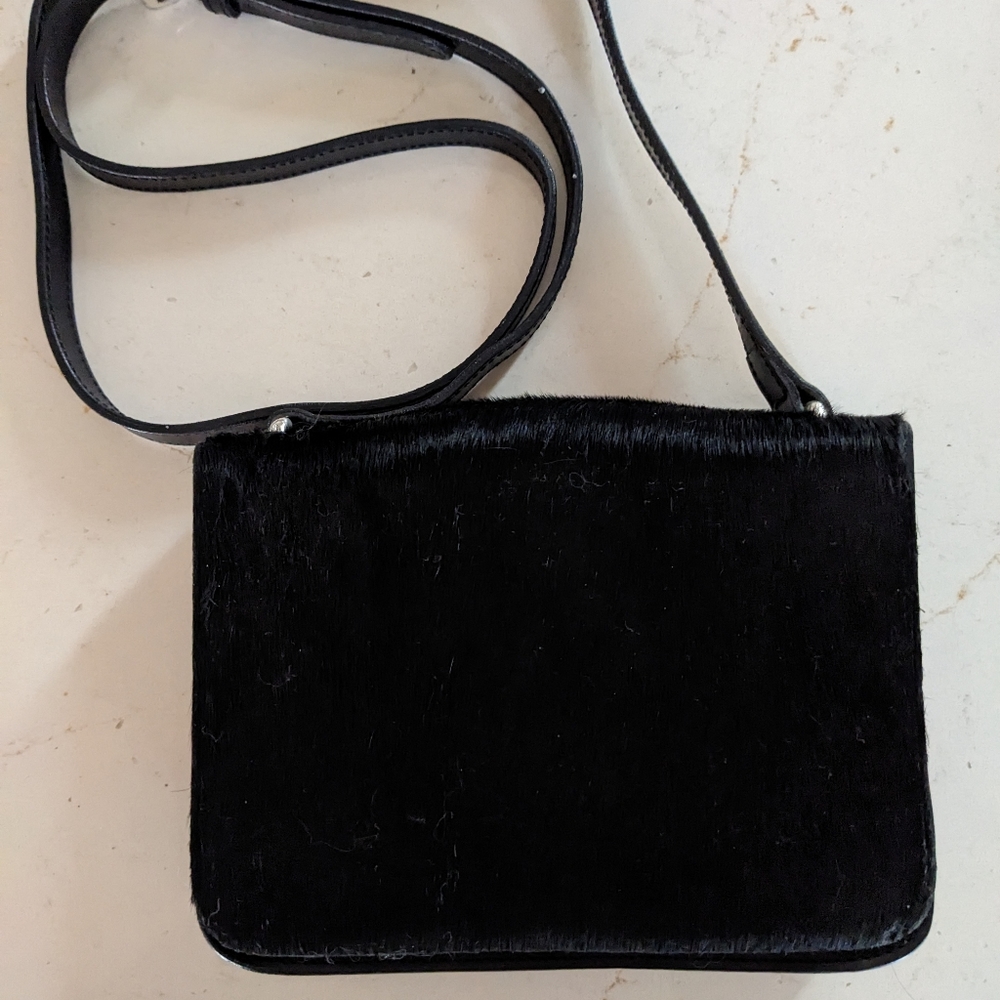 Frossil Black clutch.